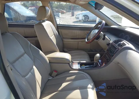 2002 Toyota Avalon Xls z USA, uszkodzony, nr VIN 4T1BF28B82U254121